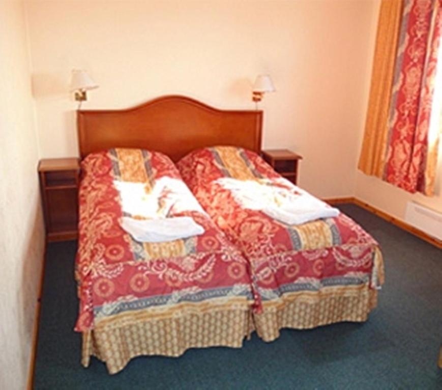 Den Hvite Rein Motel คาราช็อค ห้อง รูปภาพ